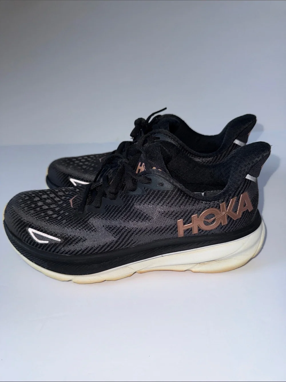 Hoka Women's Black Athletic Shoes with Rose Gold Logo